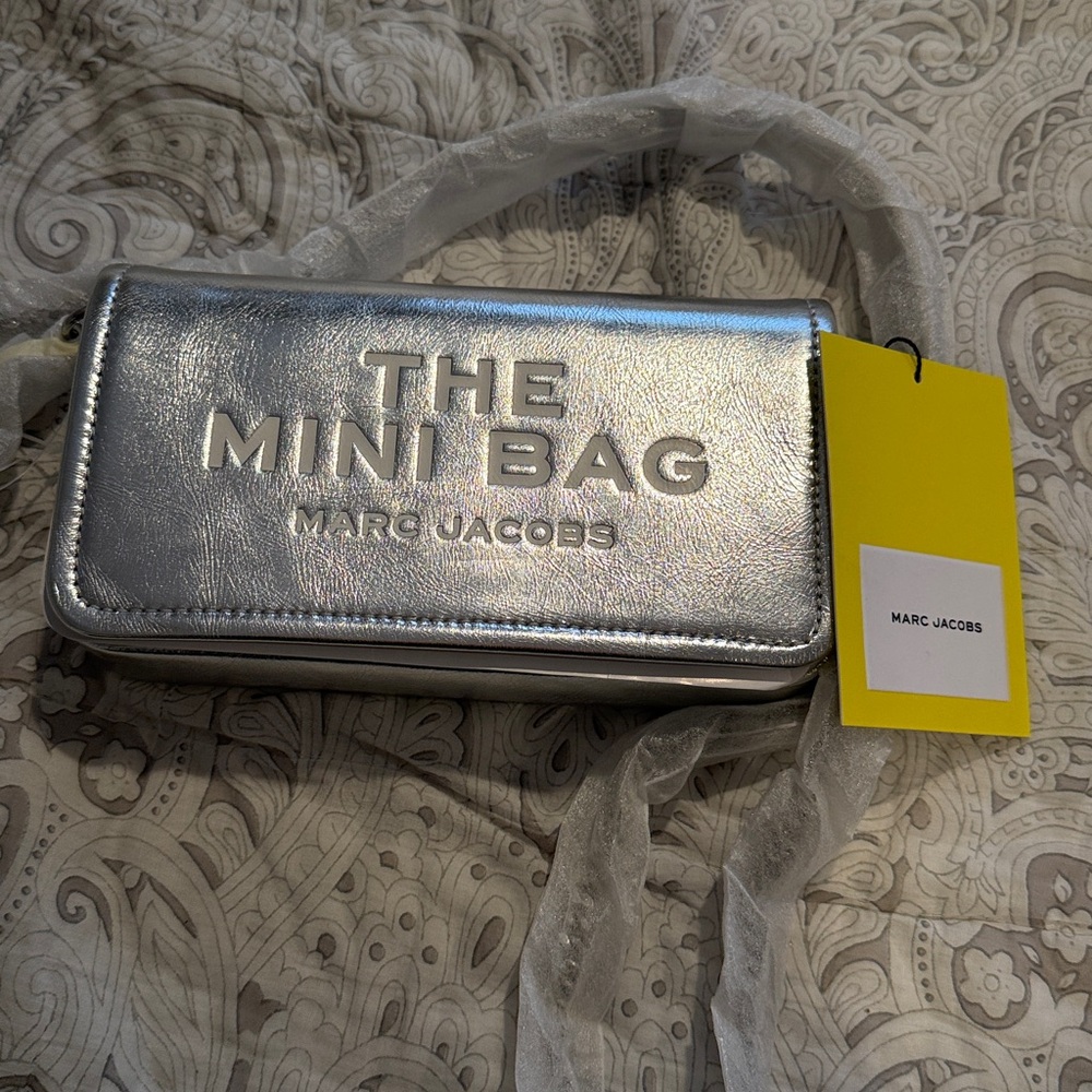NWT Marc Jacobs silver mini bag. Perfect for any occasion